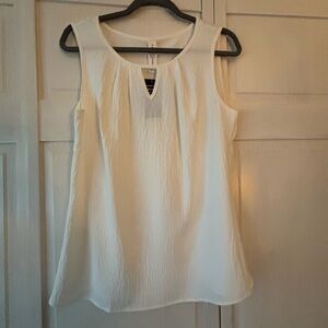 Chic Cream Sleeveless Blouse